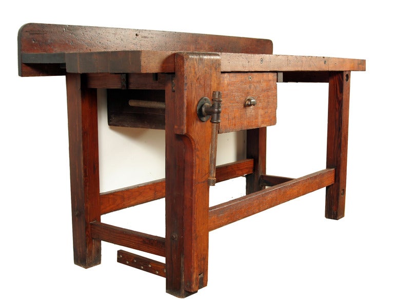 In a world overpopulated with vintage industrial workbenches, this one is actually a standout.  First, it's in excellent condition, with just enough wear to give it great character but not so much that it looks beaten to a pulp.  Next, it has very