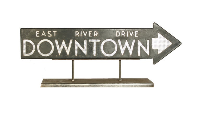 This is one of the original signs used to direct New York City drivers to the new East River Drive in 1934.  Modern New Yorkers now refer to the expanded version of this thoroughfare as the FDR.  The sign consists of riveted iron that has been die