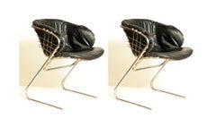Pair of Gastone Rinaldi Chrome and Leather Chairs