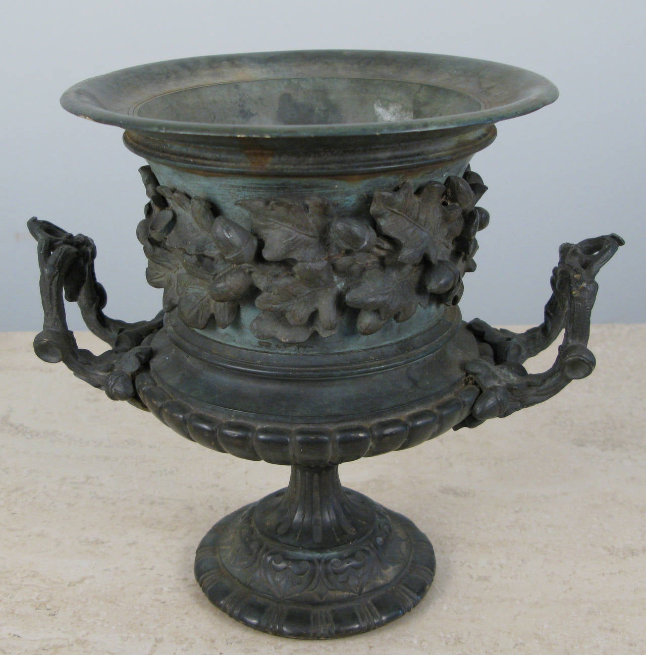 A spectacular 1870s-1880s table size bronze urn. Very fine quality acorn, leaf and twig carving. Beautifully proportioned and wonderful patina. Probably American.
