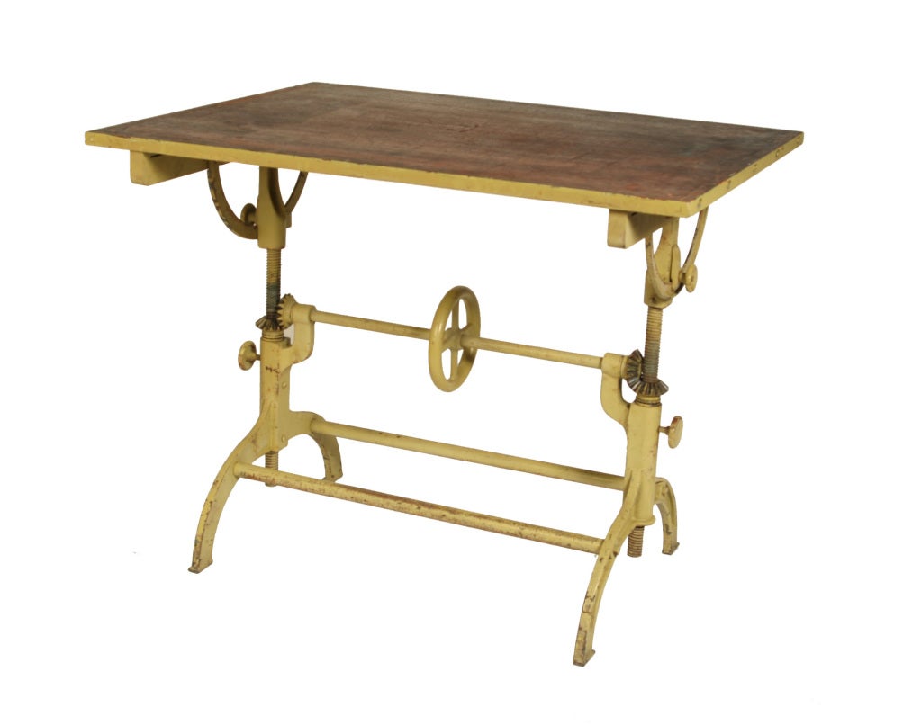 There's nothing we like better than a good vintage drafting table--unless it's a great vintage drafting table, which is exactly what this one is.  The design is outstanding, with that oversized wheel in the center and those fabulous beveled gears