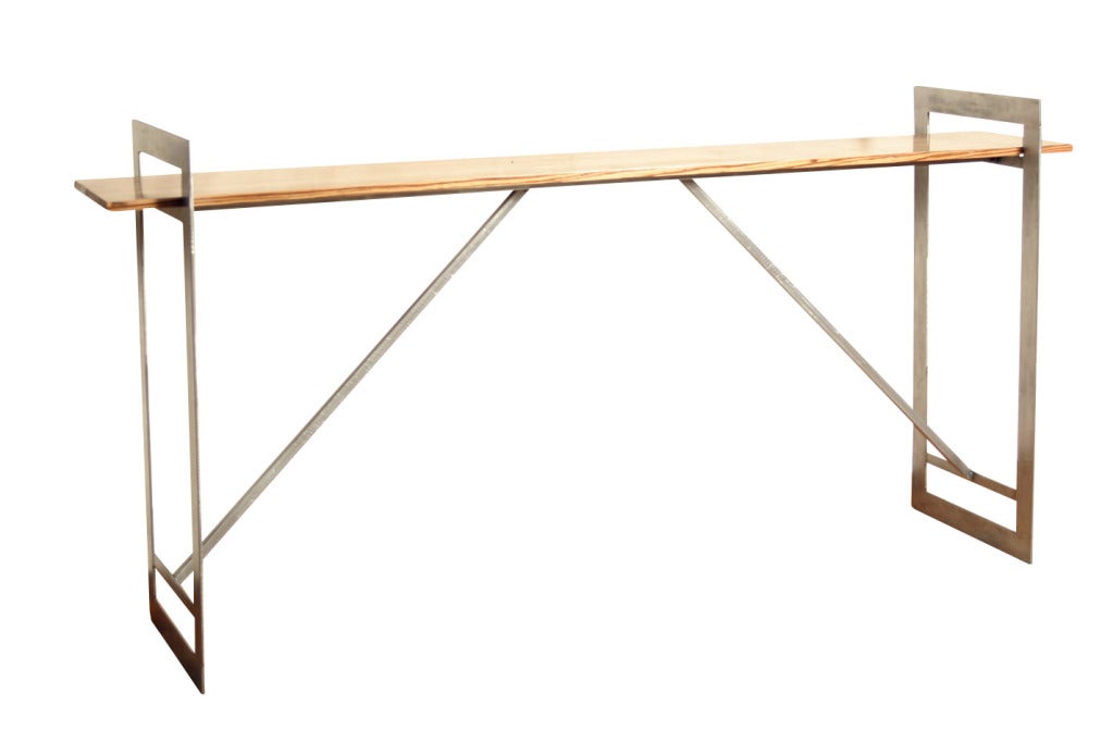 Designed and hand crafted by Doyle:Hudson co-owner Denis Ferentinos, this modern console features a slender reclaimed steel frame supporting a visually striking exotic reclaimed Zebrawood shelf.