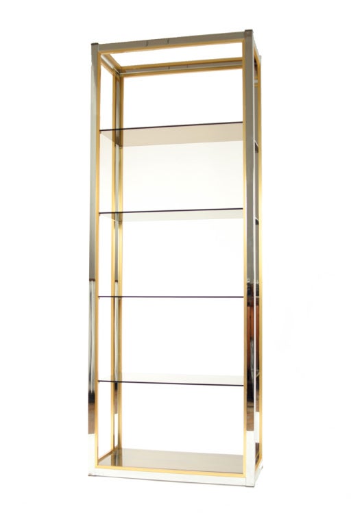 This tall six-tiered chrome, brass and smoked glass shelf unit from the 1970s is elegant, stylish and decidedly modern. Made by the Zevi Italian furniture company.