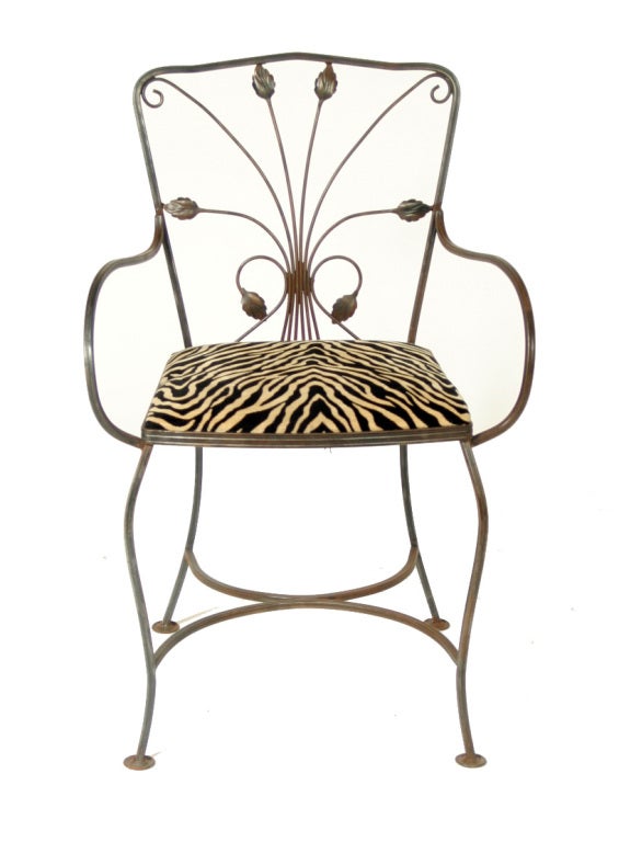 Set of Four Leaf Motif Wrought Iron Chairs