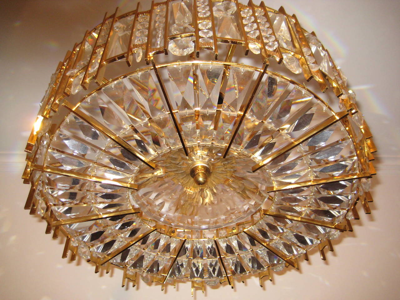Mid-Century Modern Gilded Crystal Chandelier Mounted with Superior Quality Crystals For Sale