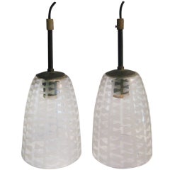 Four Pendant Light Fixtures With Etched Glass Design