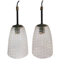 Four Pendant Light Fixtures With Etched Glass Design