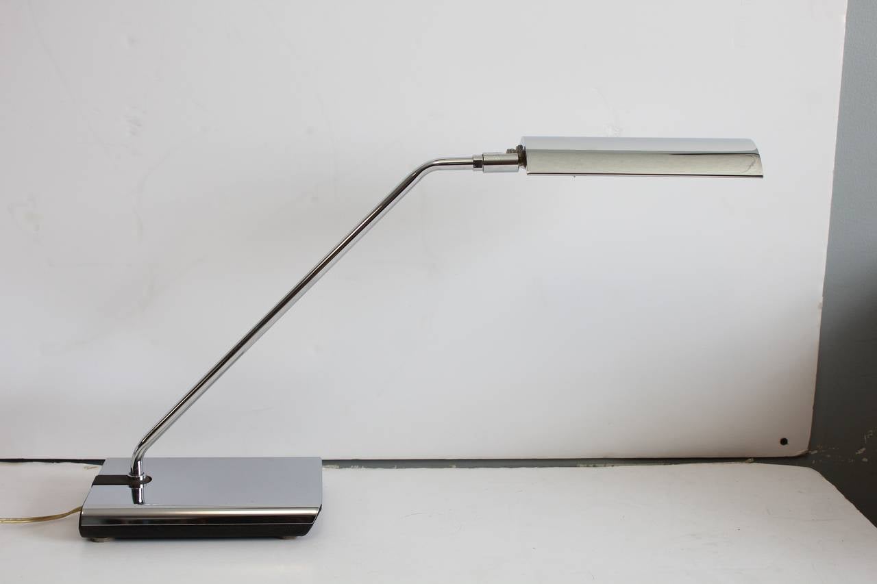 Stylish 1970's chrome and iron desk lamp by Koch & Lowy. Rewired and in working condition.