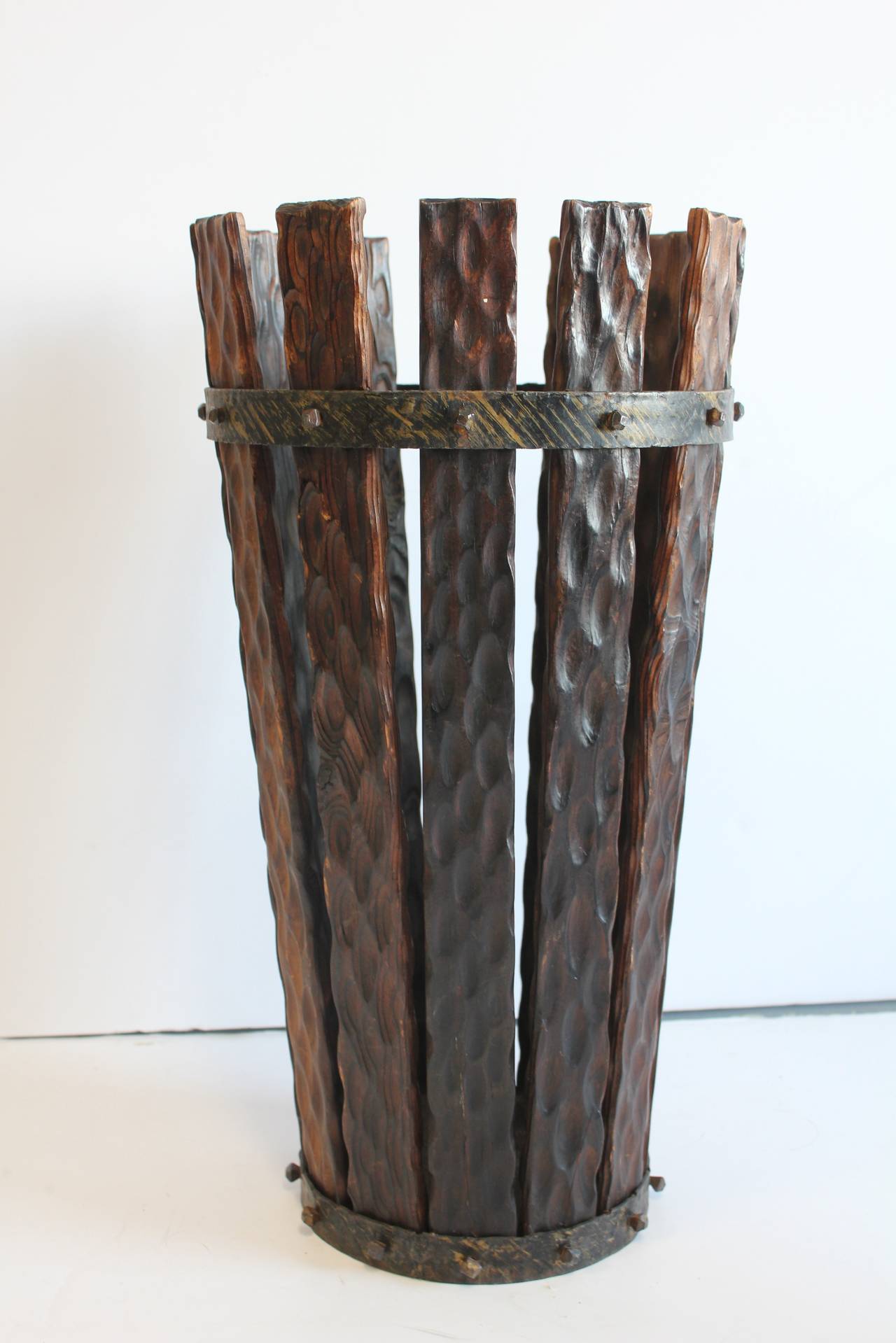 Stylish tall 1920's wood and iron umbrella stand.