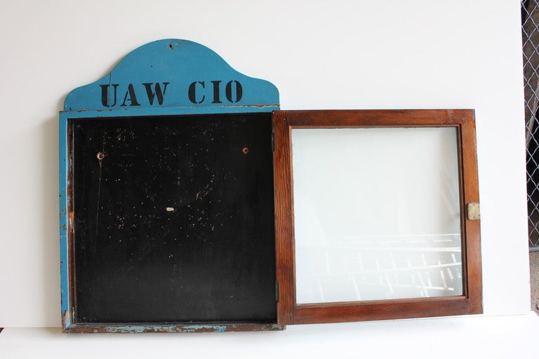 Great industrial 1950's wall display case with glass door.