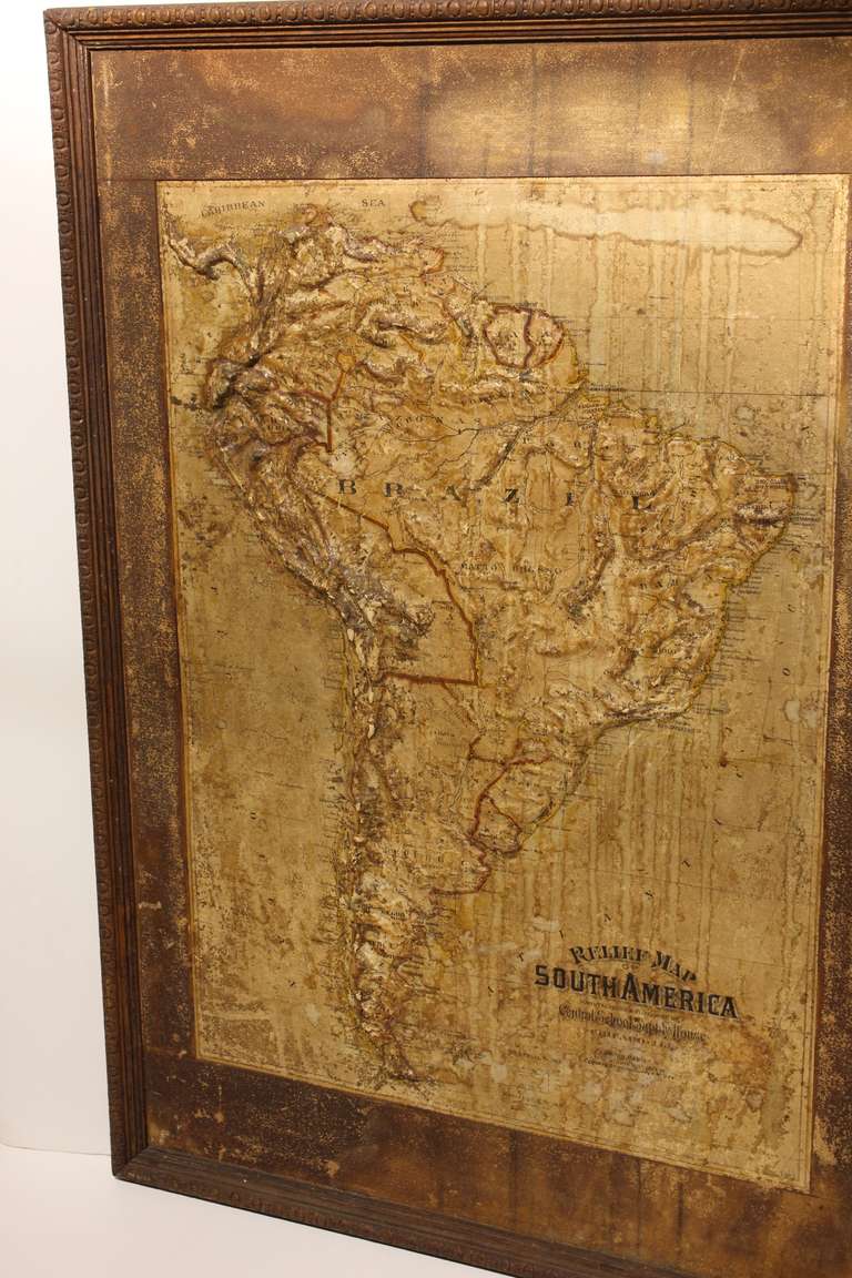 Large Late 1800's raised Relief Map of South America by Central School Supply House in Chicago. Framed in original wood frame.