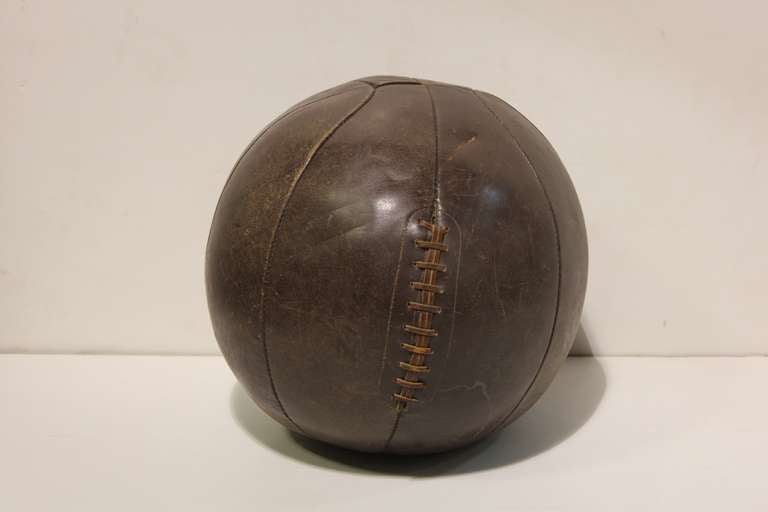Large antique leather medicine ball.
