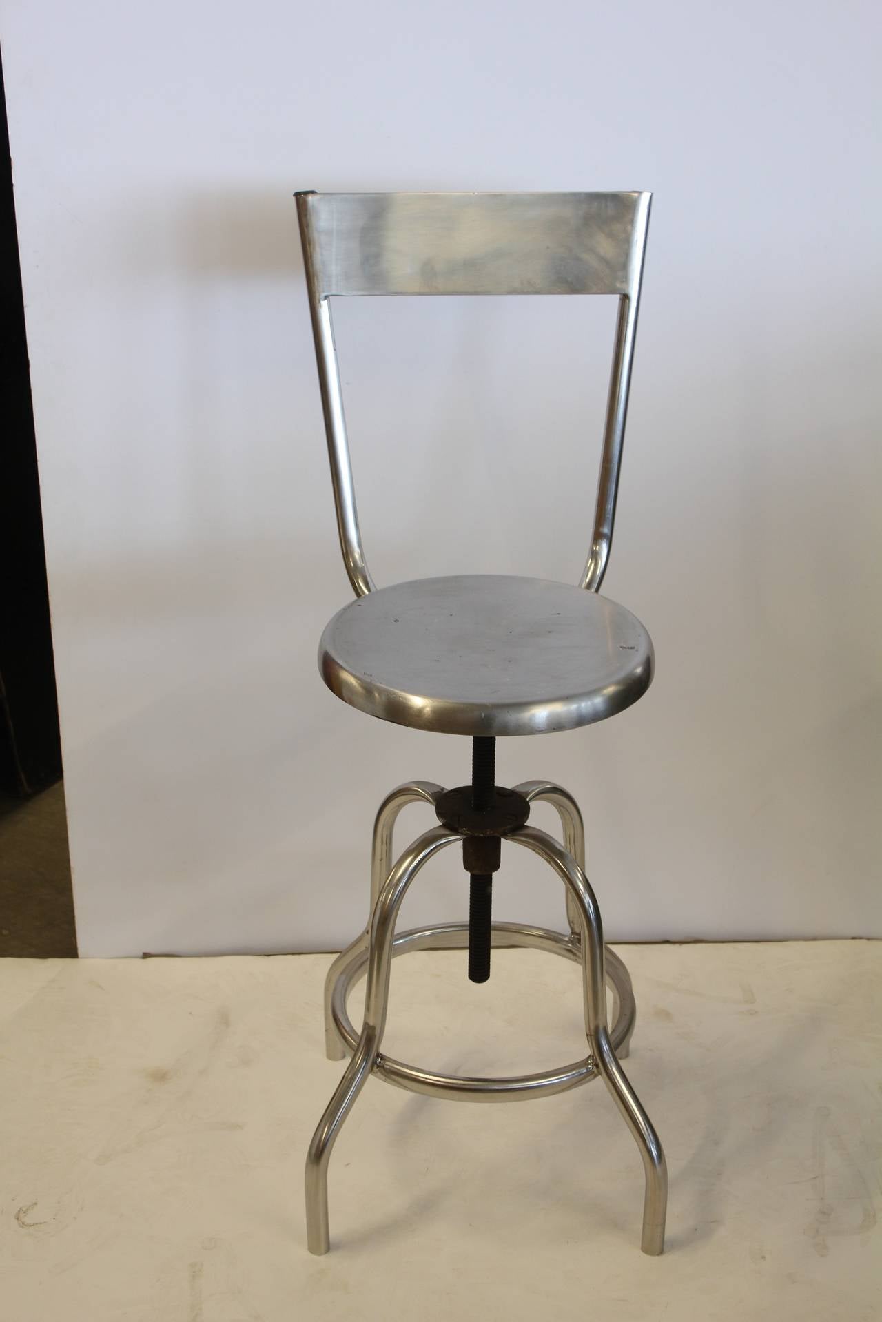 Vintage American Industrial swivel stool with adjustable height. Measures: H from 19