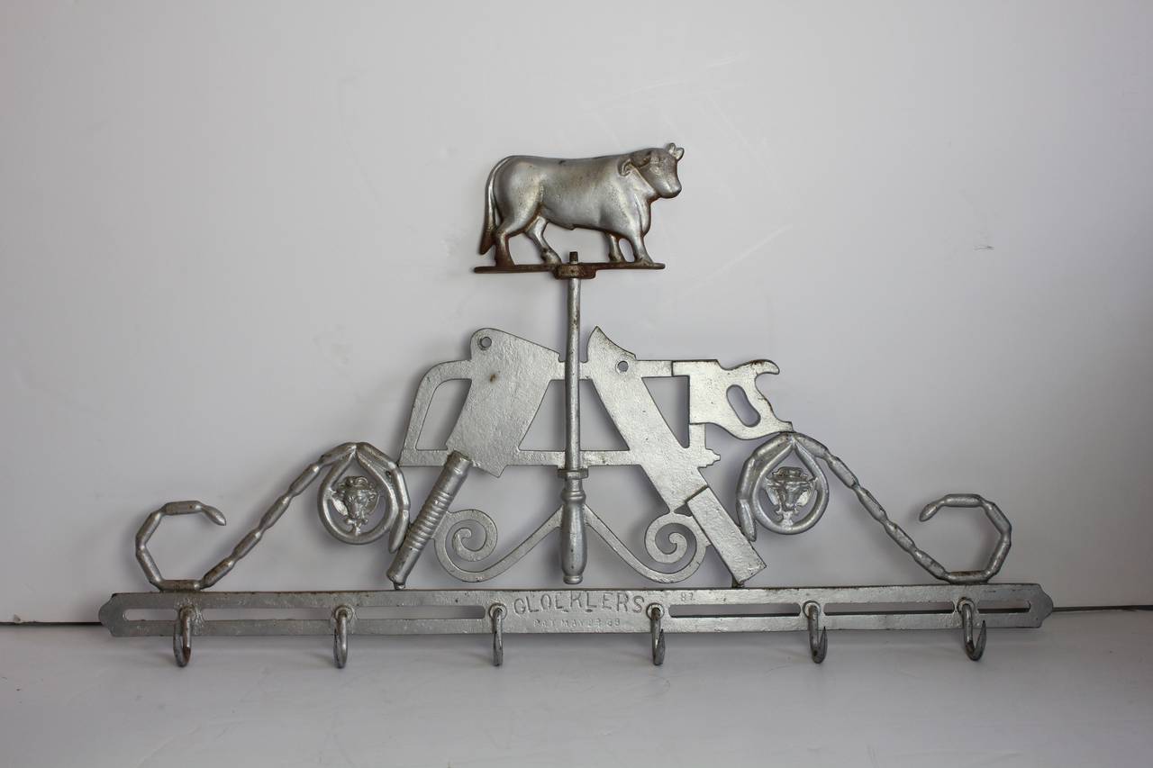 Rare antique cast iron butcher trade sign by Gloekler Co.