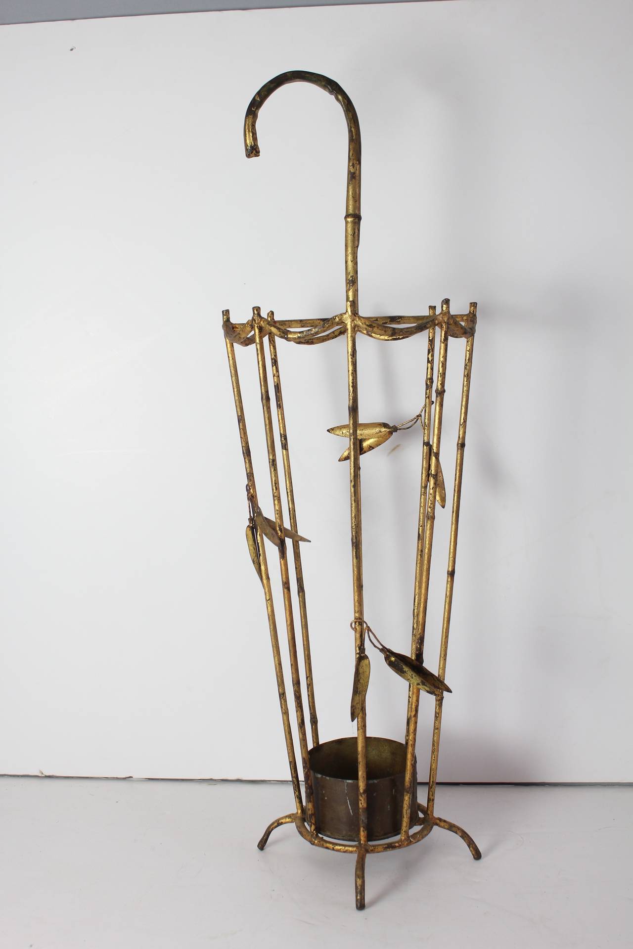 Stylish vintage Italian gilt faux bamboo umbrella stand.