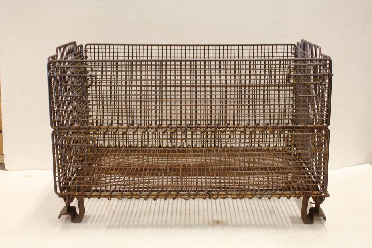 Large original American industrial collapsible wire basket. We have two available.