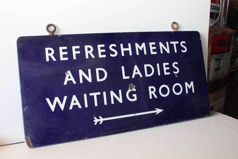 female waiting area sign
