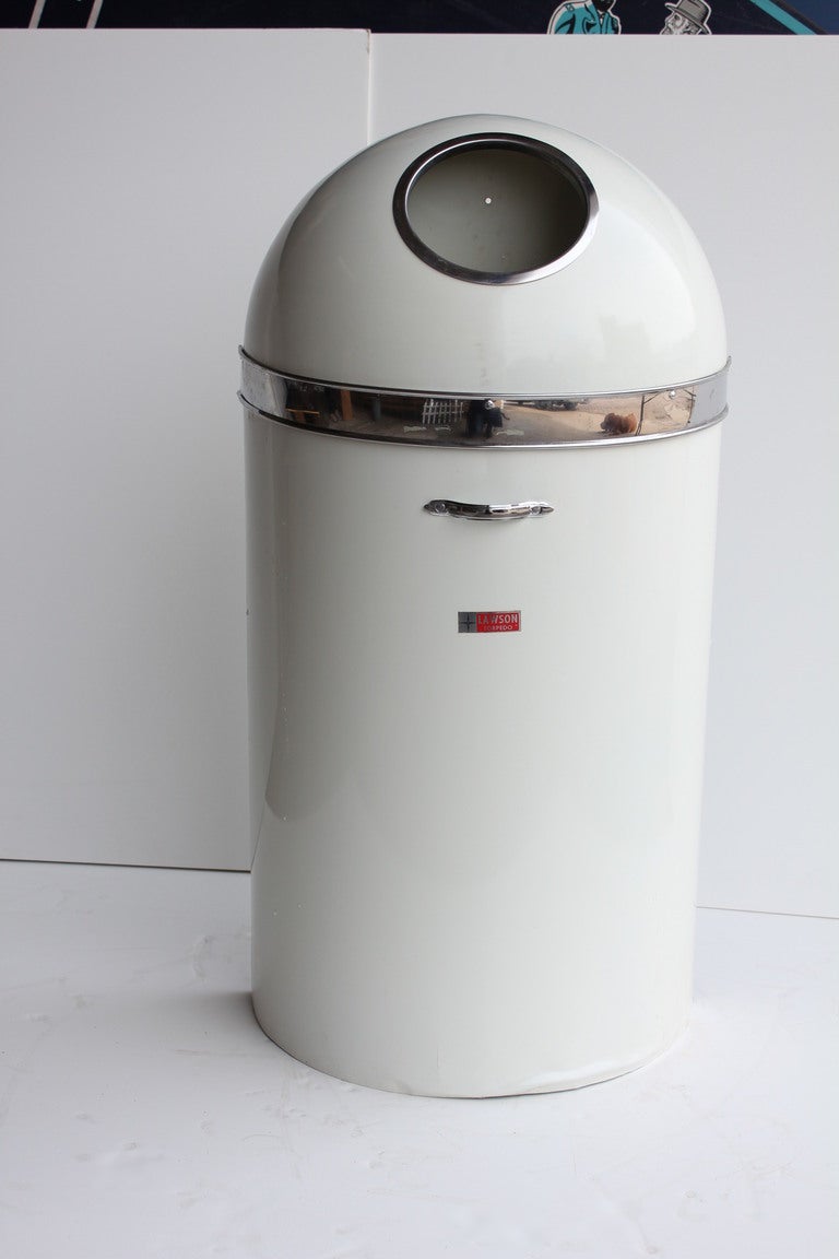 Mid Century Torpedo wall mounted trash can with chrome trim by Lawson. This can are old new stock.
