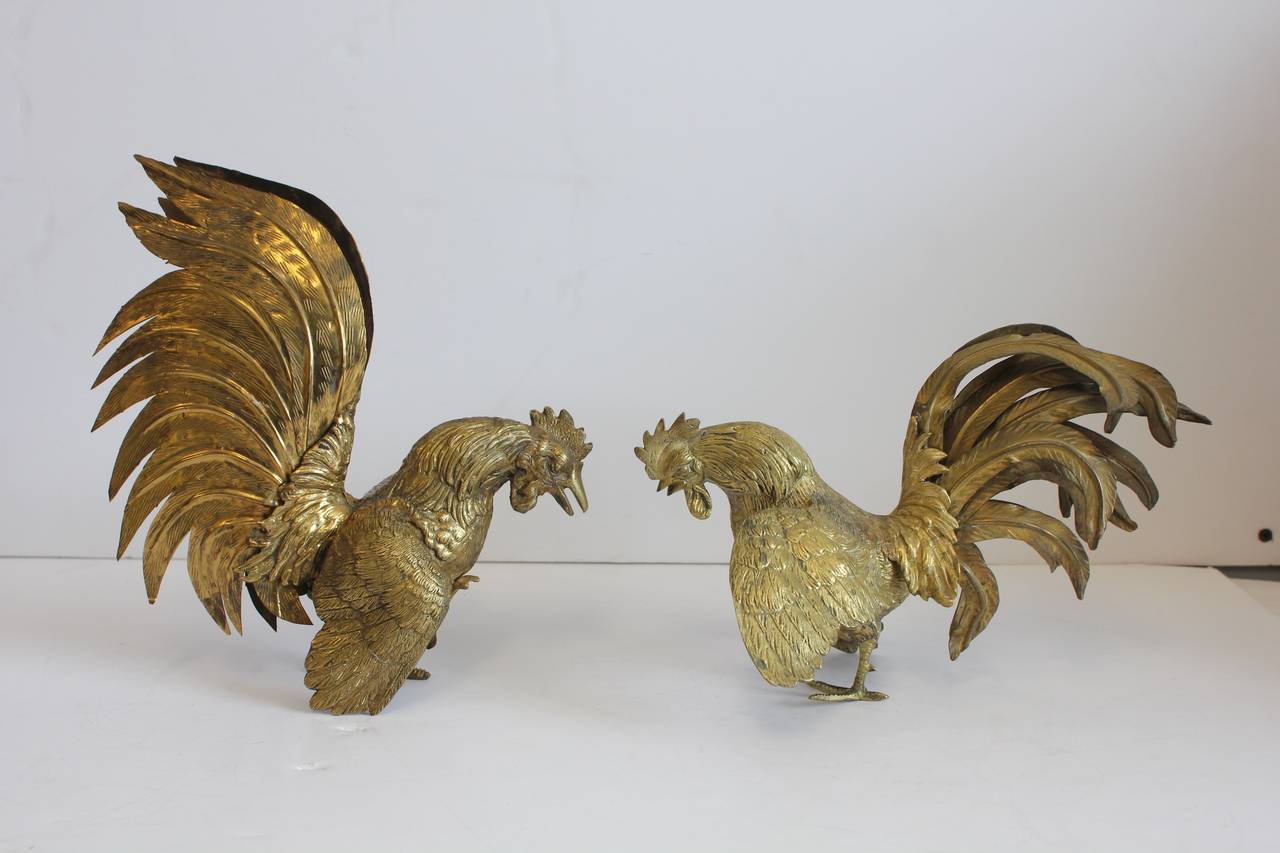 Melani Mario style brass fighting rooster sculptures. Large rooster: 9.75