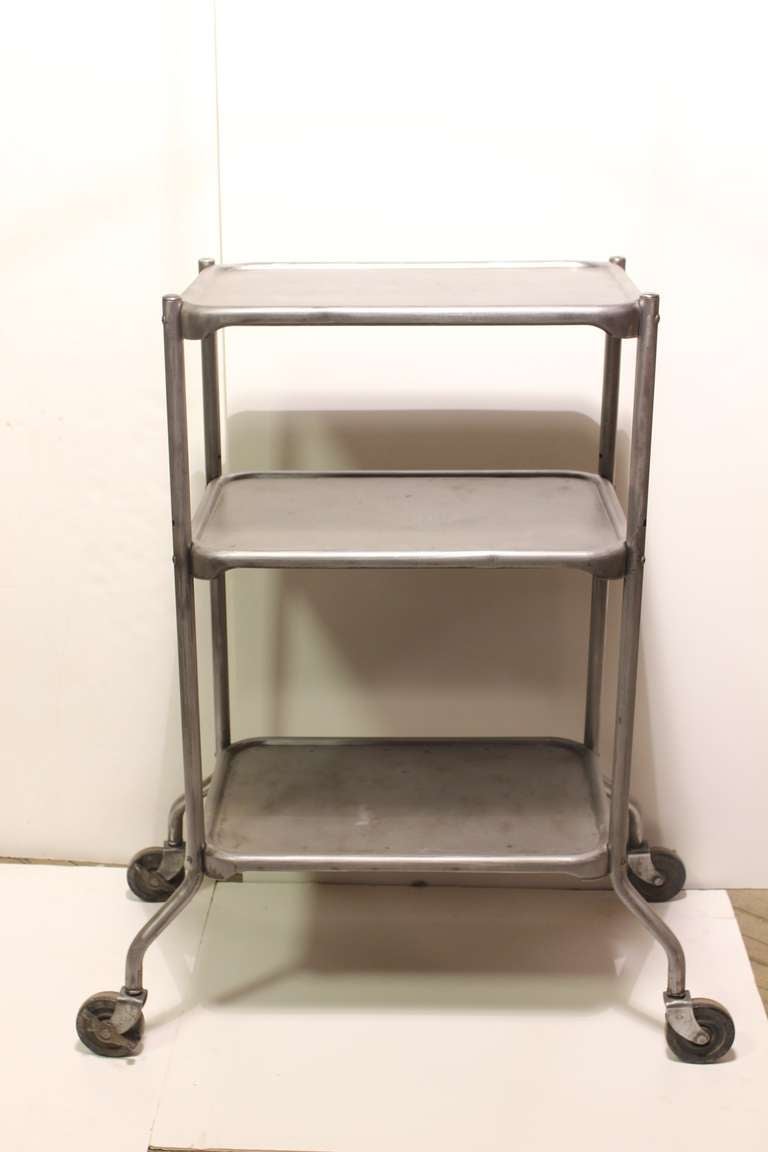 Vintage industrial 3-tier bar cart.