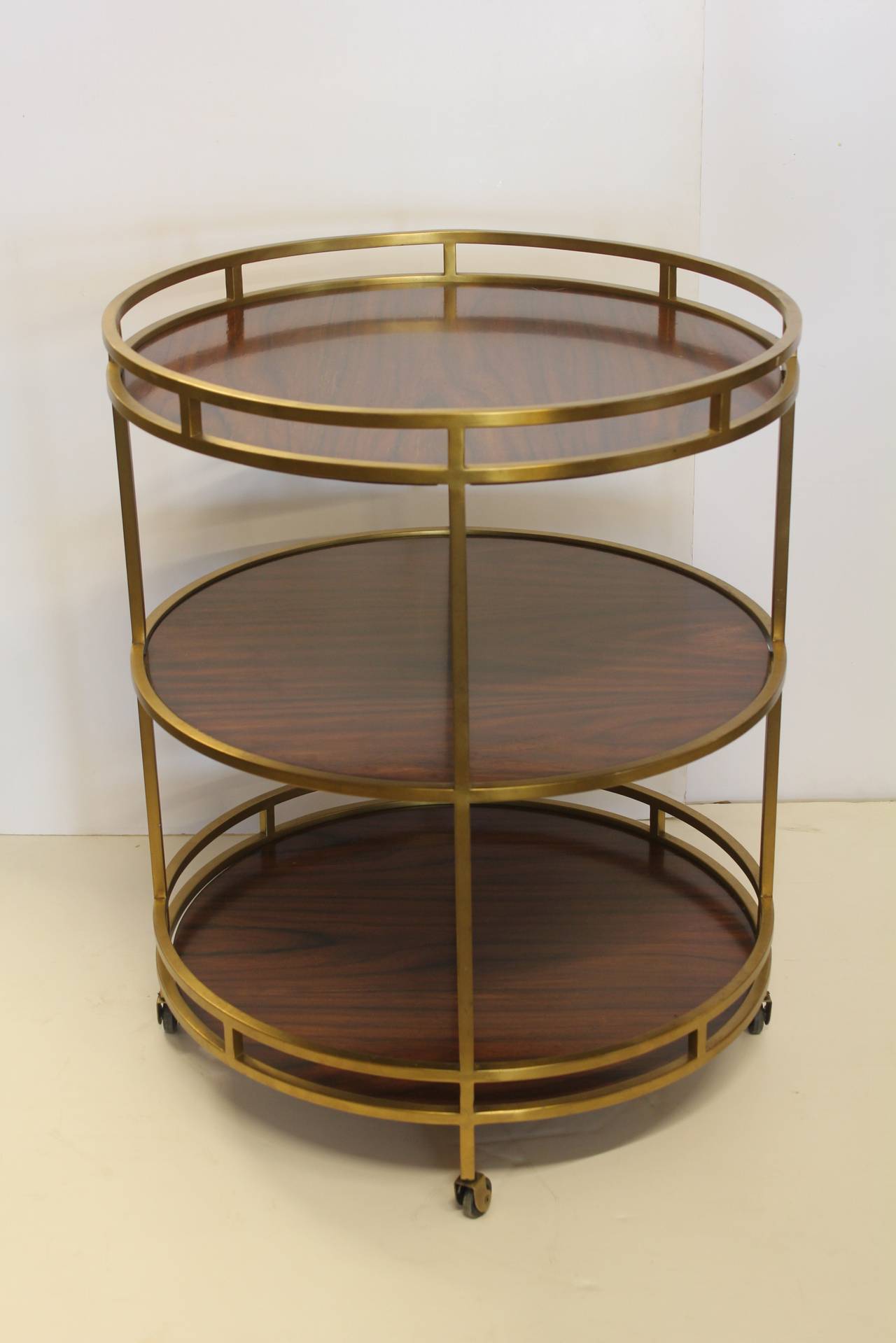 Modern three-tier bar cart by Henredon on coasters. Height of the bottom shelf 12