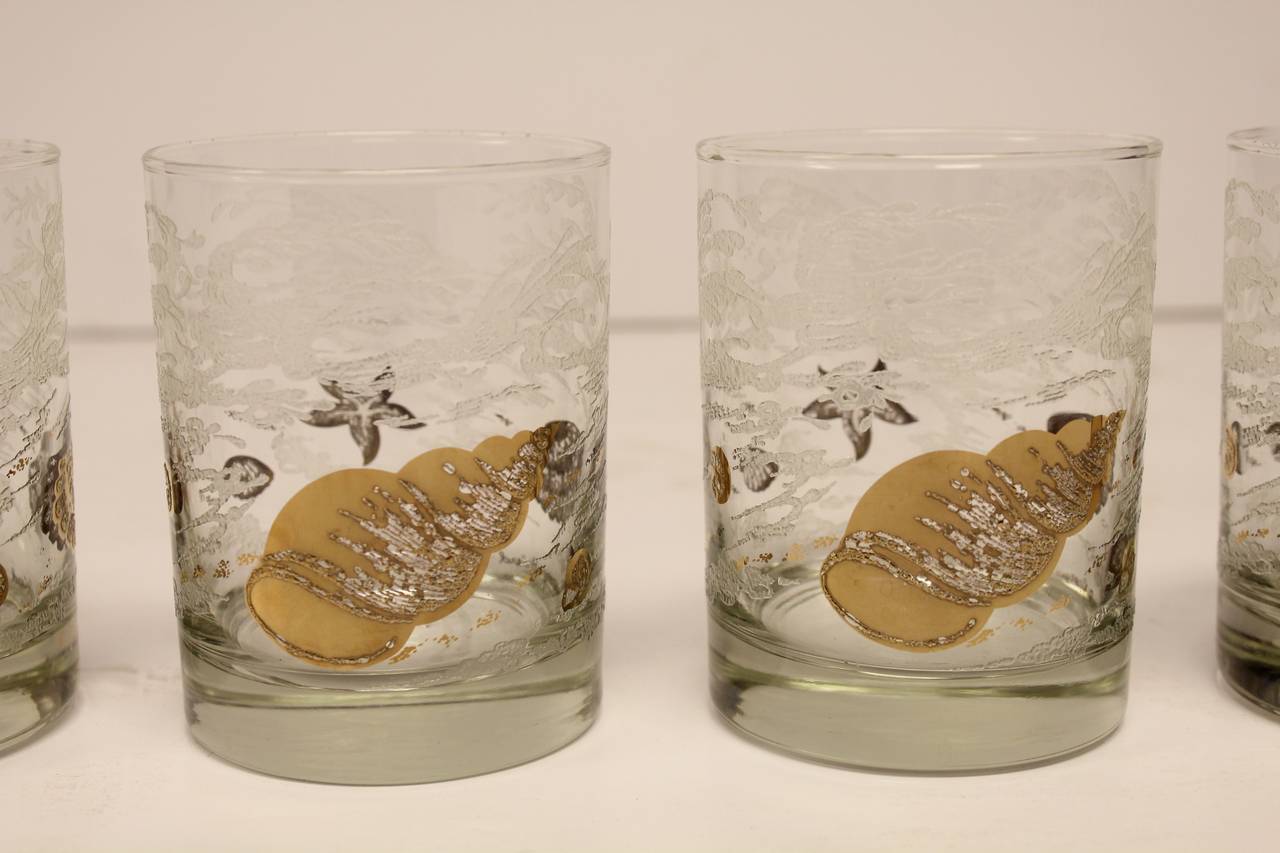 Elegant mid century sea life glassware designed by Georges Briard. They are signed.