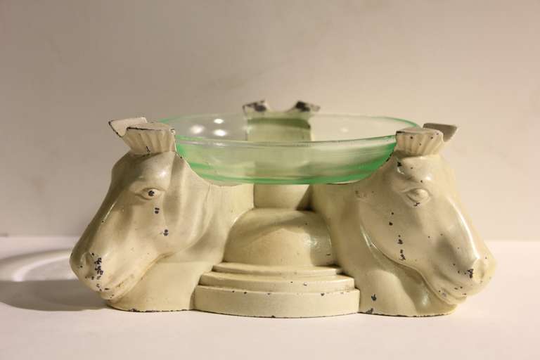 Art Deco metal ashtray with horses images and original green glass dish.