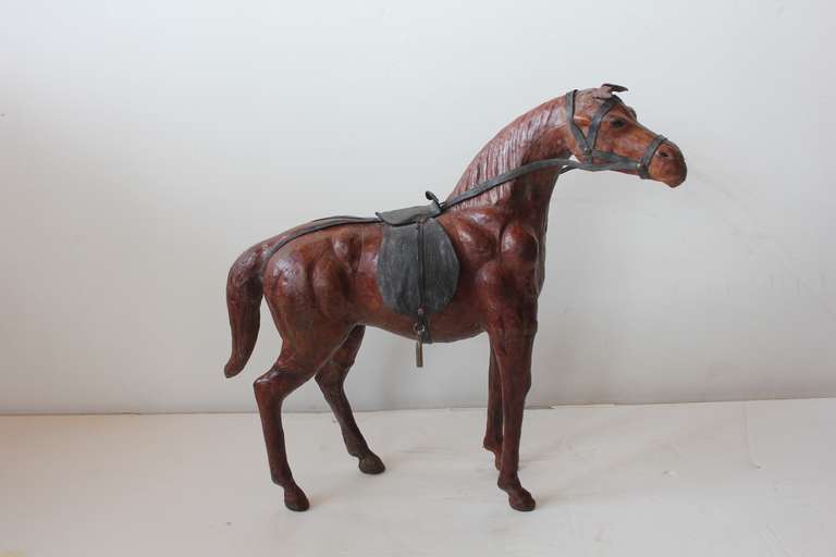 Large hand made leather horse figurine.