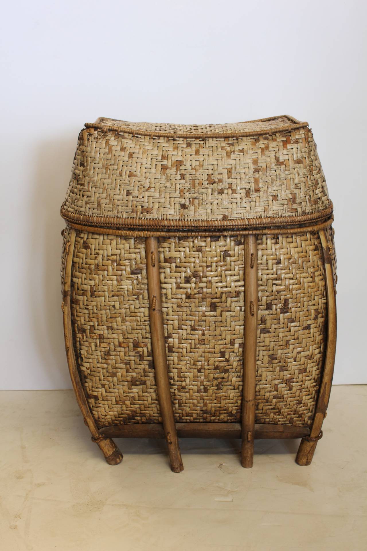 Large decorative Asian lidded woven basket.