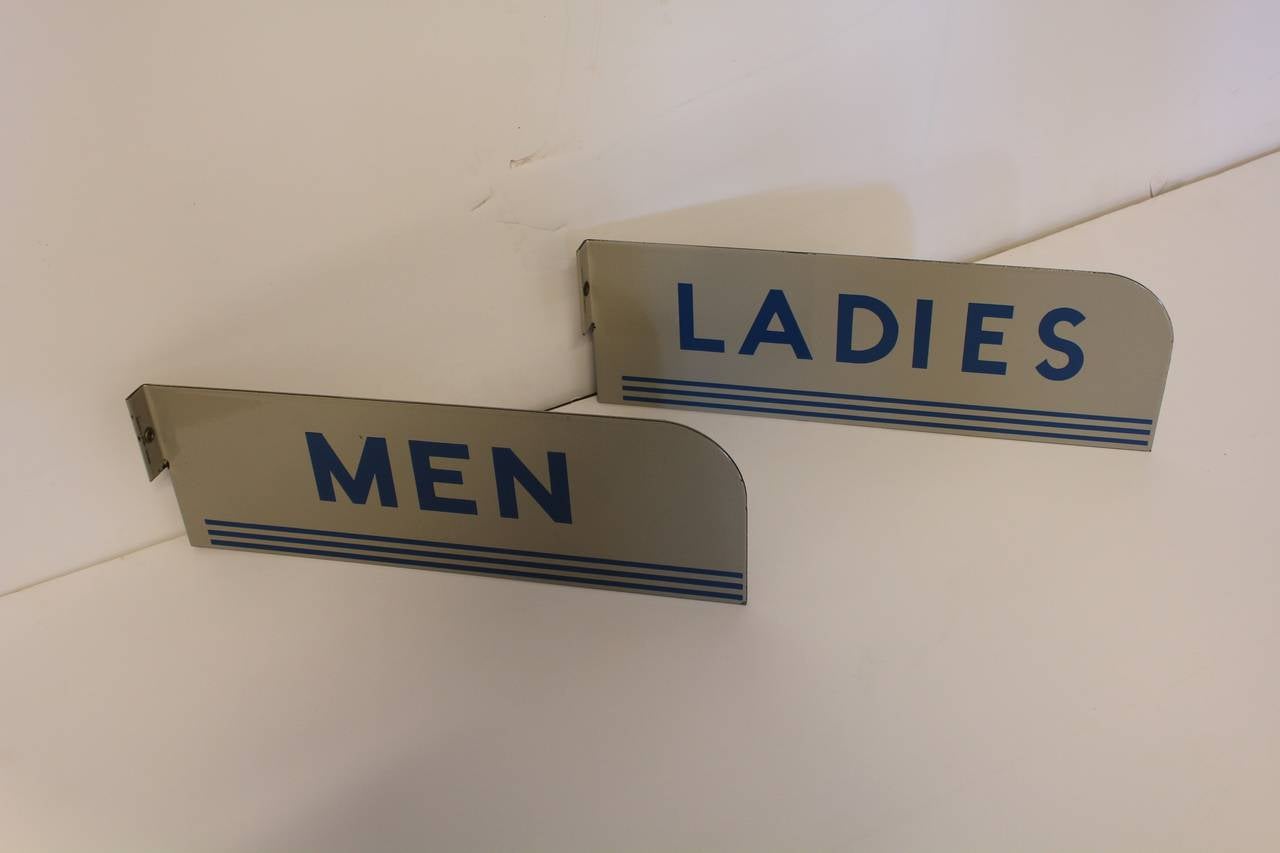 porcelain restroom sign