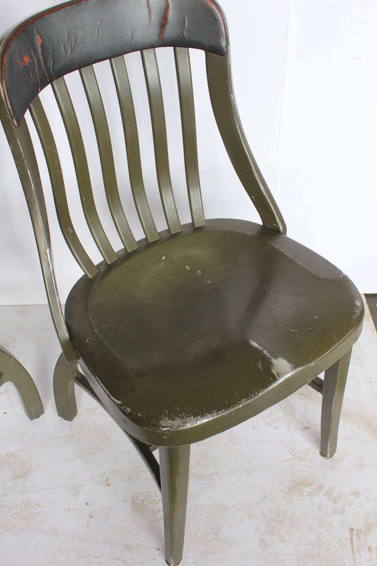 Vintage metal school chairs with top leather back by Shaw Walker.