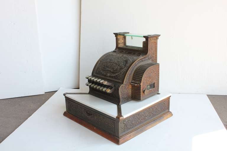 Antique candy store decorative cash register designed and manufactured by National Dayton Ohio.