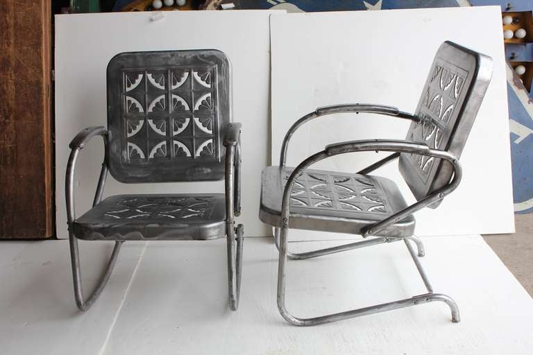 Mid Century metal garden rocker chair and arm chair.Newly refinished. 