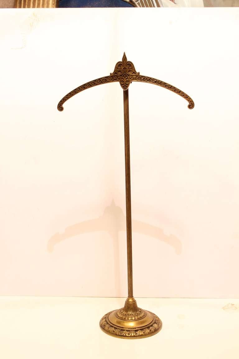 Antique brass decorative clothing display stand with adjustable height. H from 33.5