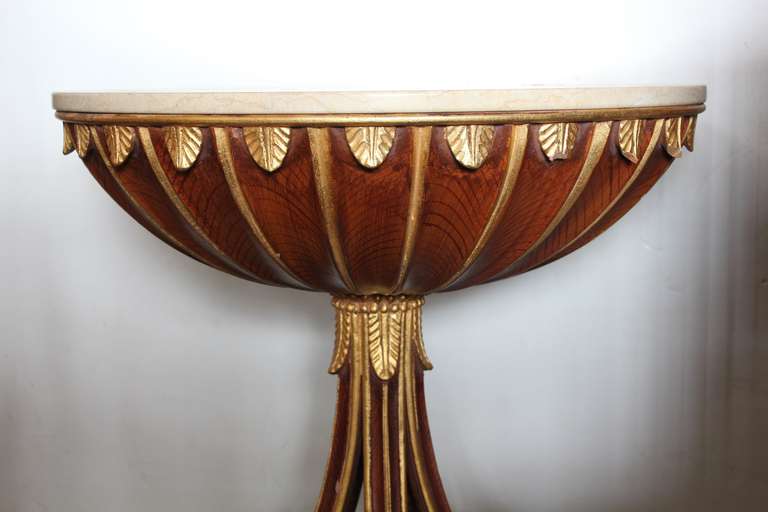 French round wood accent table with marble top.