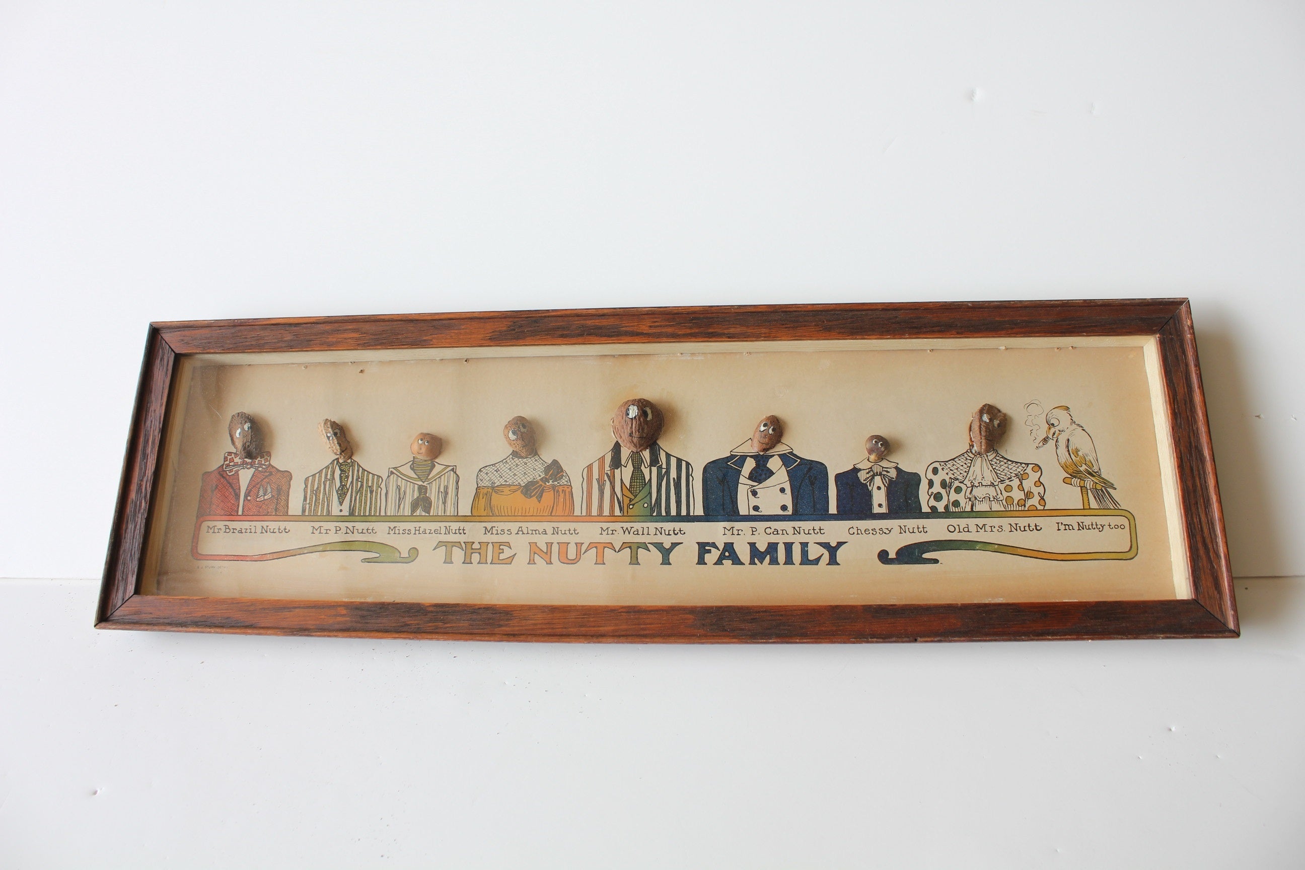 Folk Art Advertising Sign "The Nutty Family "