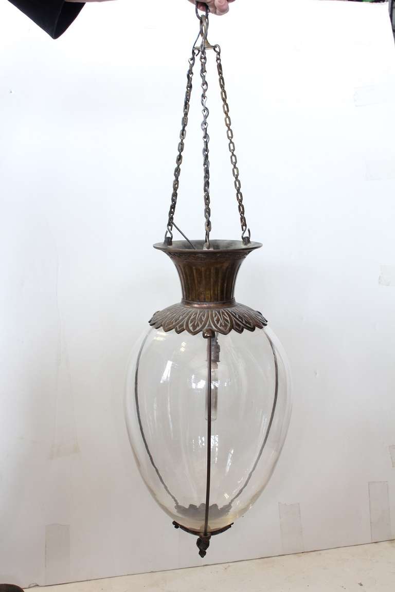 Pair of original antique drugstore East Lake style apothecary glass show globes turned to chandeliers with bronze ornate frame. We have more available.