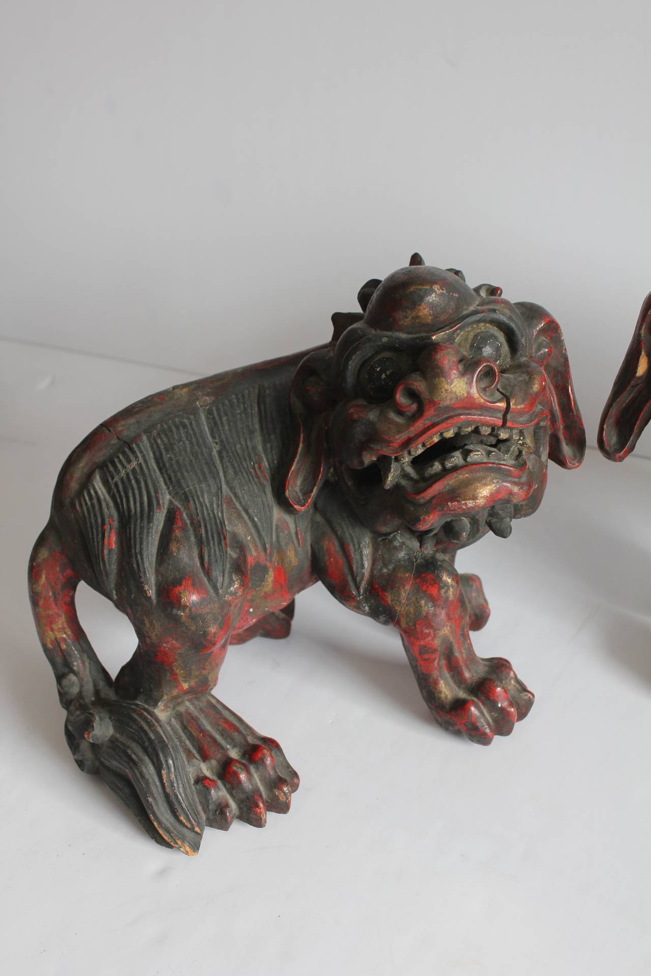 Polychromed 19th Century Chinese Carved Foo Dogs For Sale