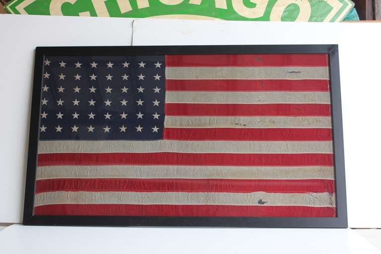 Original 48 stars American flag. newly framed in wooden frame.