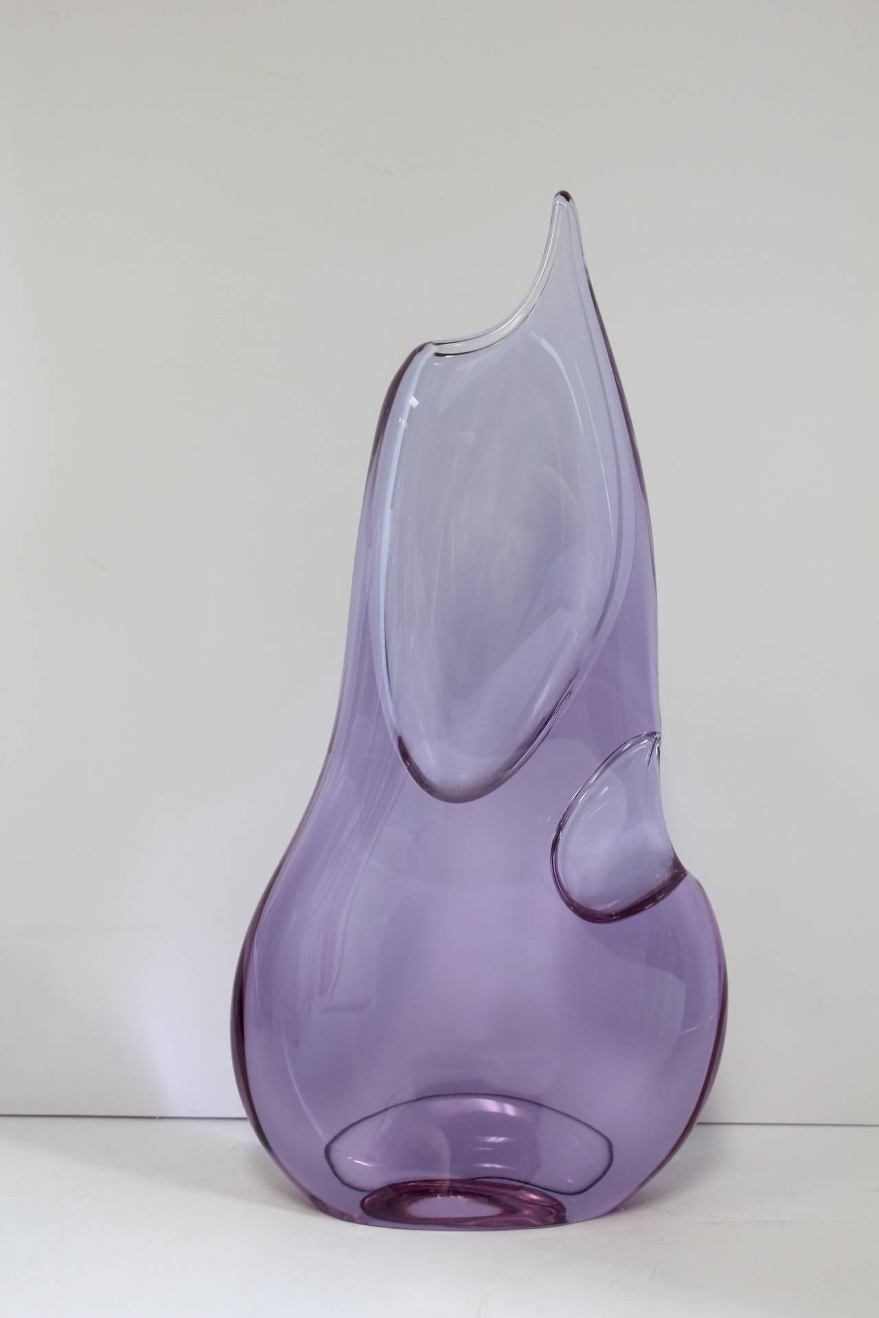 Stylish mid century Alexandrite purple glass vase.