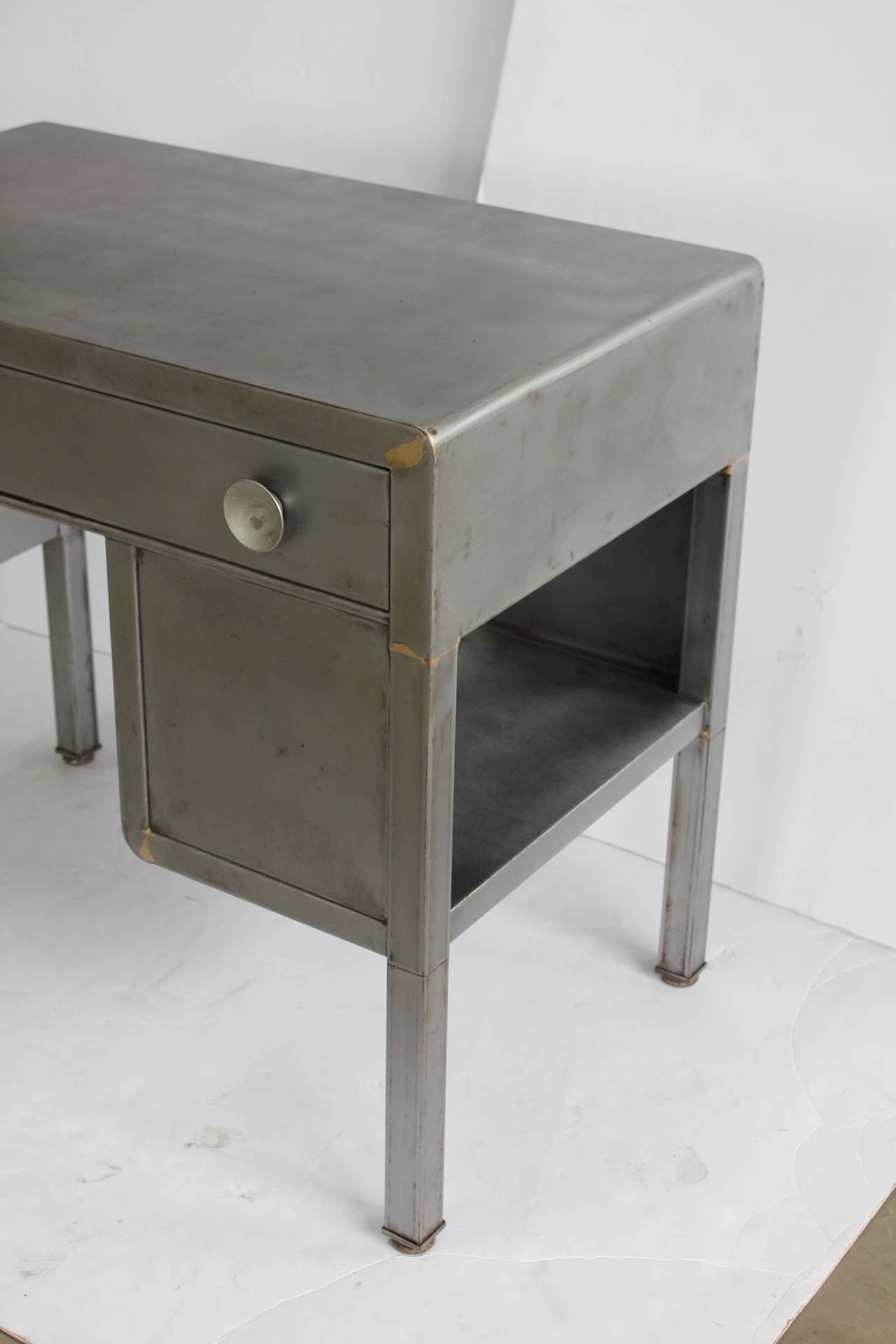 Vintage industrial metal desk by Norman Bel Geddes.