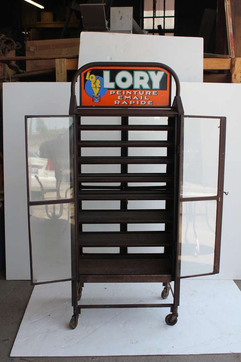 Antique French Industrial Advertising Metal Cabinet In Good Condition For Sale In Chicago, IL