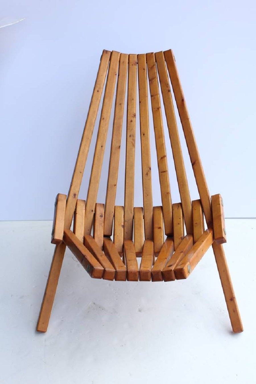 Mid-Century wood folding lounge chair. We have two chairs available.