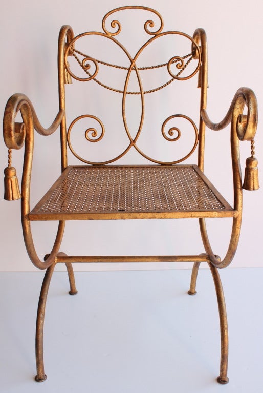 Mid Century Italian Regency Gilded Metal Rope and Tassel arm chair.