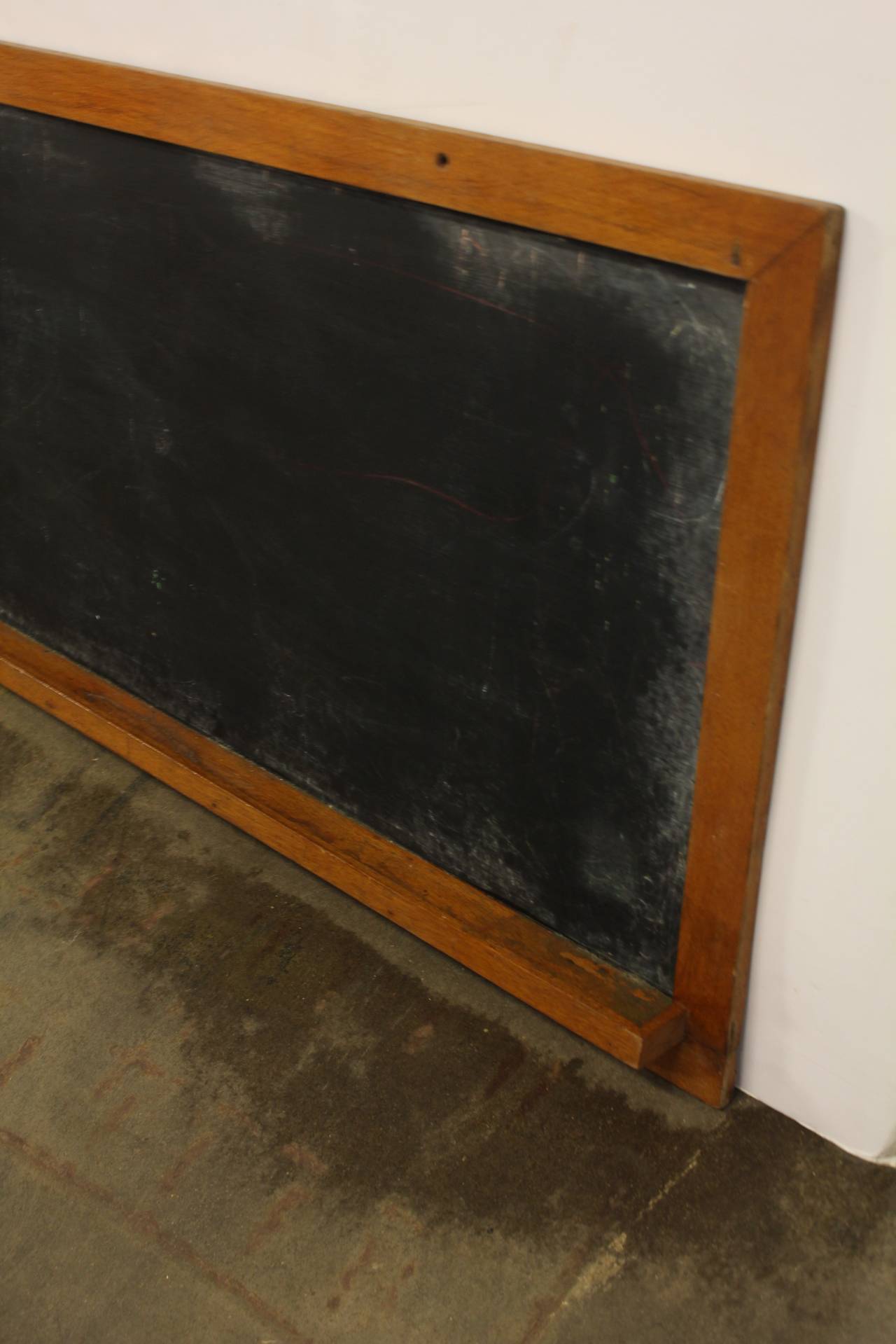 8ft long antique American school chalkboard in original oak frame.