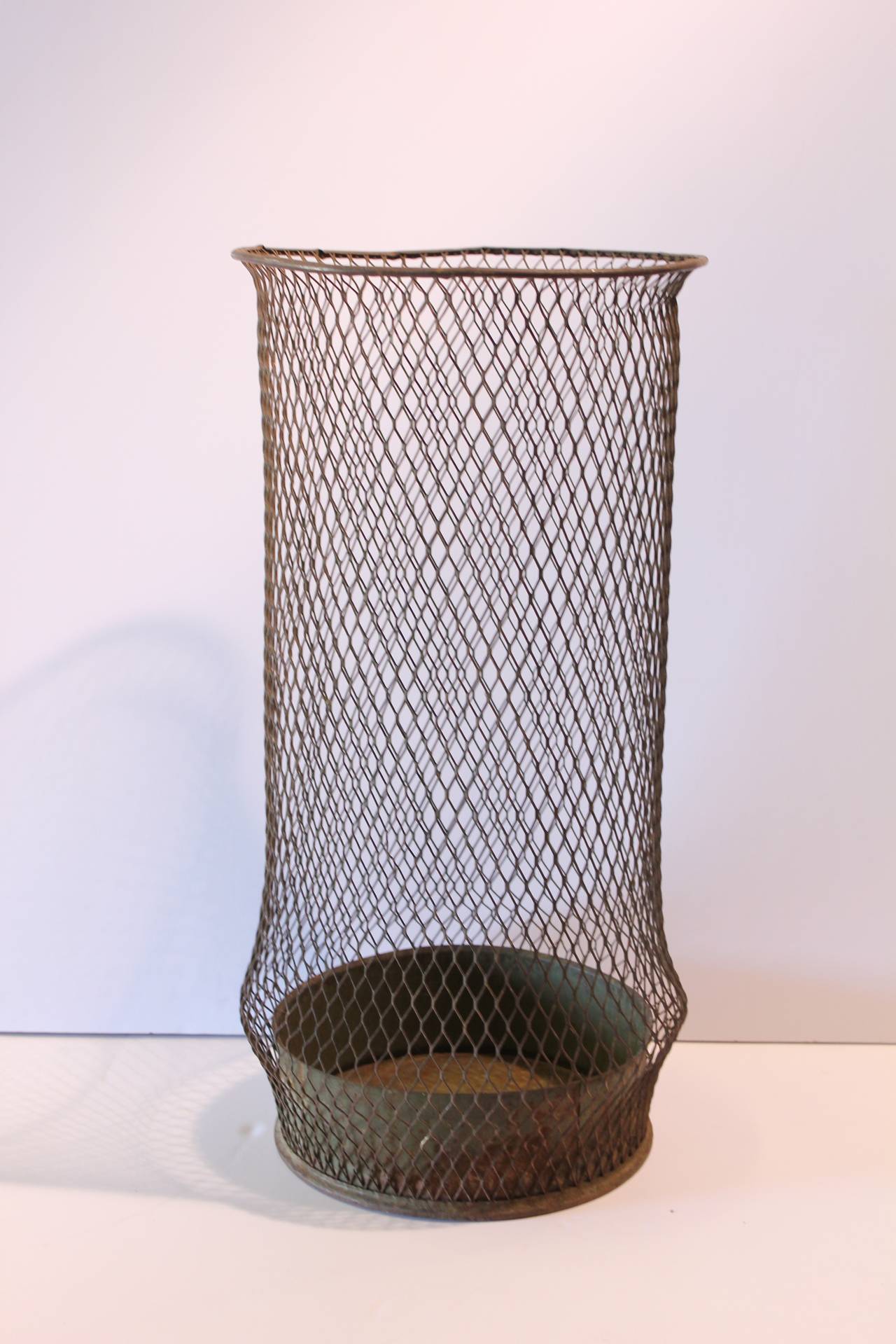 Early 20thy century tall American Industrial metal waste basket.