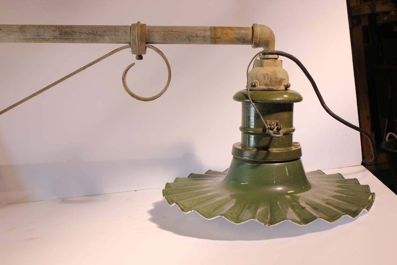 Large Early 20th Century American Industrial City Street Wall Sconce with green enamel shade. In working condition. We have more available.