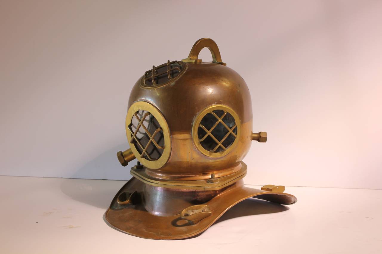 Lifesize vintage brass replica of diving helmet.