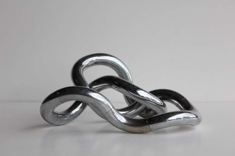 Original 1980's plastic Tangle sculpture designed by Richard X Zawitz. Size is adjustable.