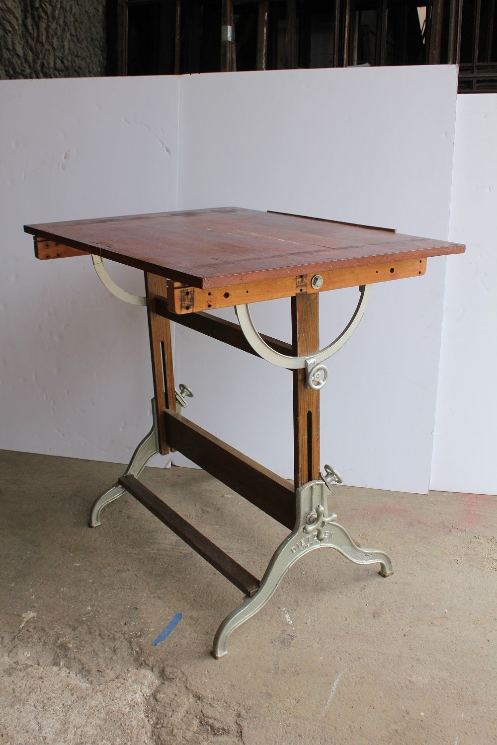 Antique American Drafting Table By Dietzgen with cast iron base.